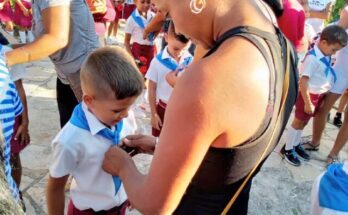The first time of a blue school scarf 1 Contramaestre's students become Moncadista PioneersContramaestre's students become Moncadista Pioneers